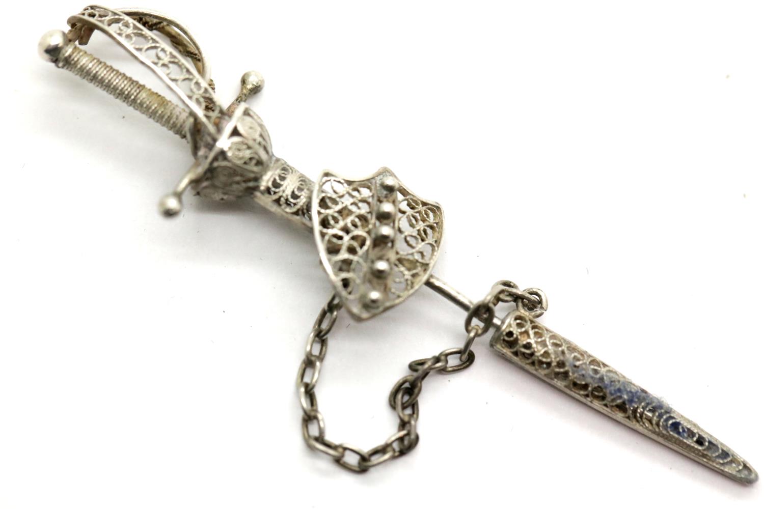 Silver plated pin brooch in form of a sword, L: 7 cm. P&P Group 1 (£14+VAT for the first lot and £