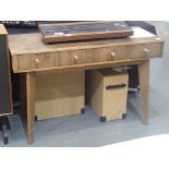 Cumbrae furniture by Morris of Glasgow, a walnut three drawer desk on four tapered supports. Not