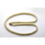 Flat pearl choker with a 14K gold clasp. Pearls 5: mm, L: 45 cm, 27g. P&P Group 1 (£14+VAT for the