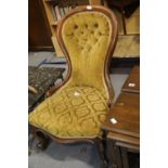 Victorian walnut framed upholstered spool back chair with shaped legs. Not available for in-house