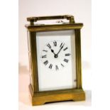 French brass carriage clock, H: 11 cm. P&P Group 1 (£14+VAT for the first lot and £1+VAT for