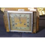 Art Deco oak cased Tower mantel clock, working at lotting, H: 18 cm. P&P Group 3 (£25+VAT for the