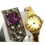 Gold plated Rotary wristwatch and an amethyst set clip. P&P group 1 (£14 + VAT for the first lot and