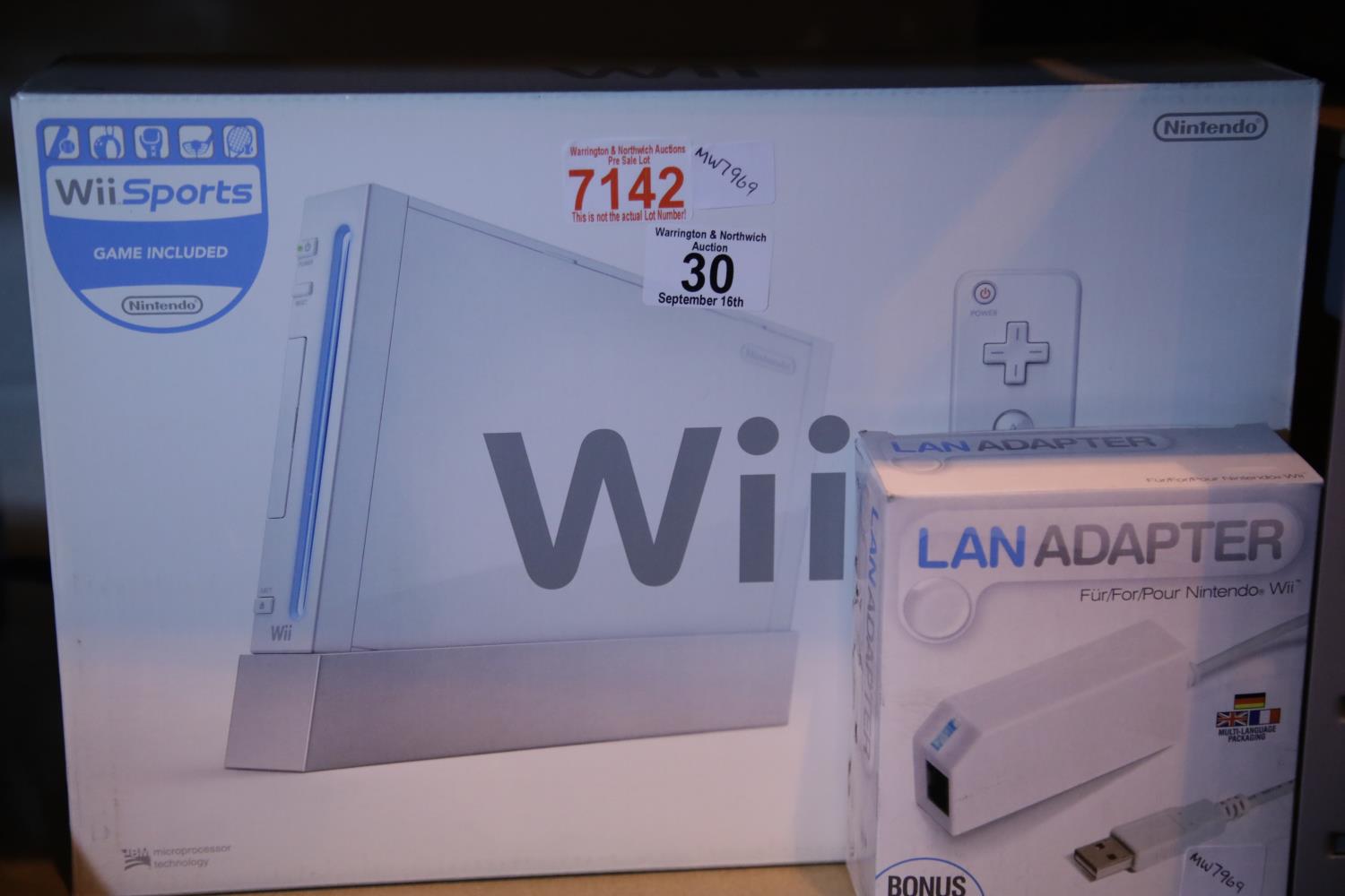 Nintendo Wii sports and Lan adaptor in original packaging. Not available for in-house P&P