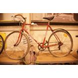 Pavyc red gents racing bike. Not available for in-house P&P.