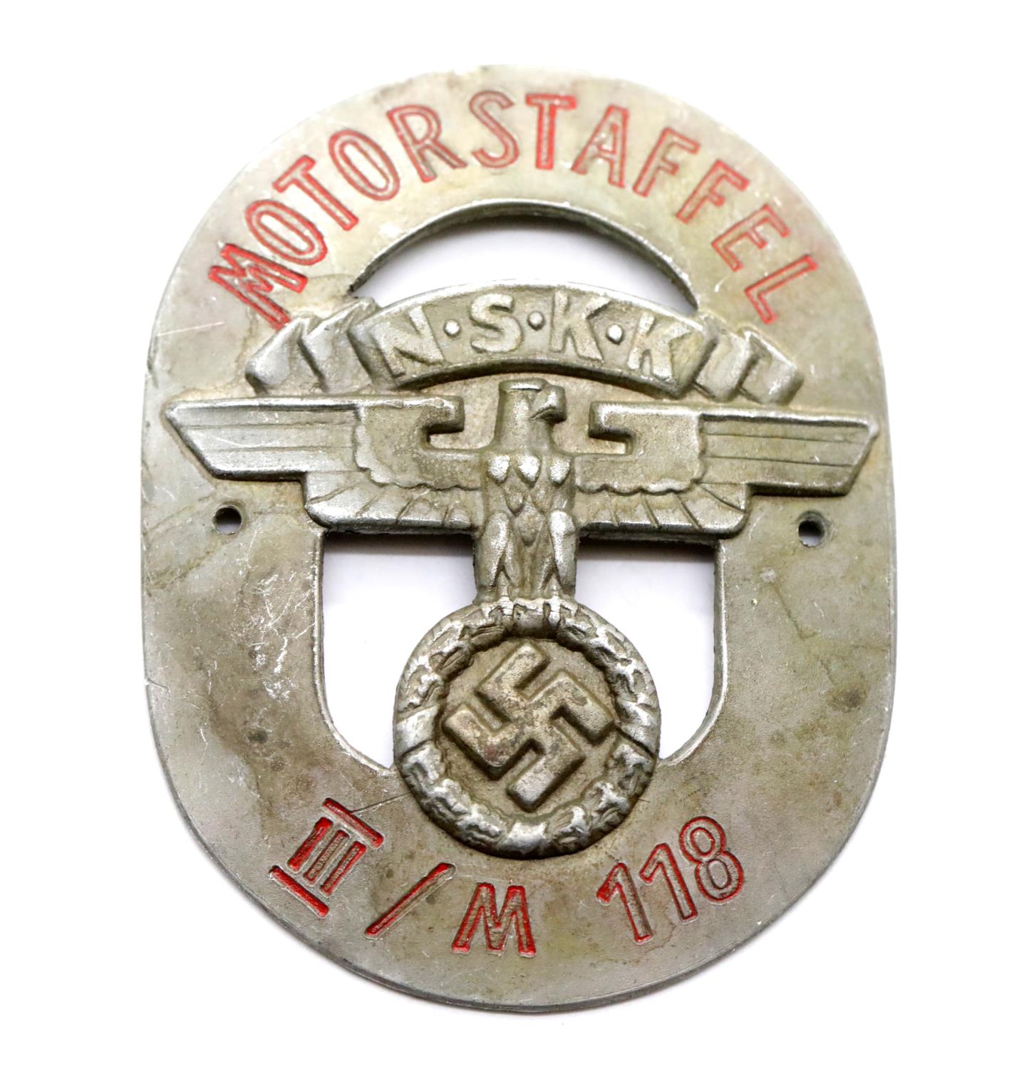 German WWII type NSKK Motor Staffel pressed aluminium badge. P&P Group 1 (£14+VAT for the first