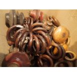 Box of antique wooden curtain rings and finials. Not available for in-house P&P