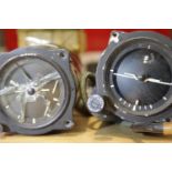 Two aeroplane horizon instruments, one with damaged glass. Not available for in-house P&P