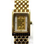 Ladies gold plated dress watch with 1g of 24ct gold ingot set in dial. P&P Group 1 (£14+VAT for