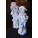Pair of continental figurines with baskets. P&P Group 2 (£18+VAT for the first lot and £3+VAT for