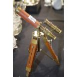 Brass and leather telescope on stand, H: 32 cm. P&P Group 3 (£25+VAT for the first lot and £5+VAT