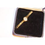 Ladies cocktail watch by Excalibur on gold tone strap. P&P Group 1 (£14+VAT for the first lot and £