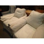 A pair of vintage sitting room armchairs, having modern cream covers. Not available for in-house P&