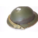 British WWII type D Day helmet with side Royal Artillery decal. P&P Group 3 (£25+VAT for the first