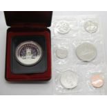 Cased Canada silver dollar and a 1977 proof set. P&P Group 2 (£18+VAT for the first lot and £3+VAT