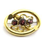 Victorian yellow metal stone set brooch, D: 4 cm. P&P Group 1 (£14+VAT for the first lot and £1+