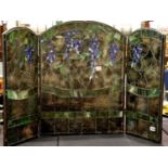 A large stained and leaded glass three-fold fire screen, 120 x 79 cm, some panels with cracks but