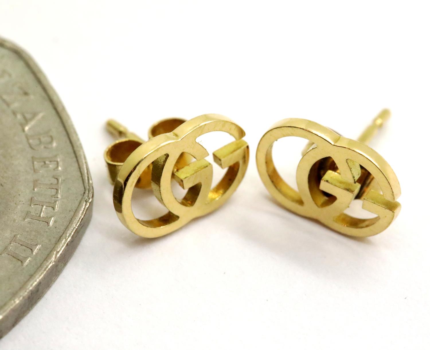 Pair of Gucci 18K gold earrings. 1.5g P&P Group 1 (£14+VAT for the first lot and £1+VAT for