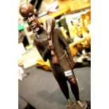 Large carved African hardwood figurine, H: 70 cm. P&P Group 3 (£25+VAT for the first lot and £5+