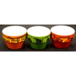 Three Poole Pottery planters in orange and green, two signed AF, one CC. P&P Group 3 (£25+VAT for