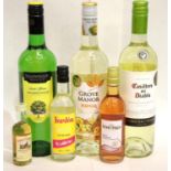 Three bottles of white wines, two miniature wines and a miniature Famous Grouse whisky. P&P Group