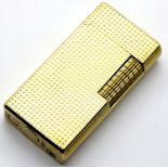 Dunhill gold plated lighter. P&P Group 1 (£14+VAT for the first lot and £1+VAT for subsequent lots)