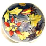 Moorcroft blue ground floral large bowl, D: 18 cm. P&P Group 2 (£18+VAT for the first lot and £3+VAT