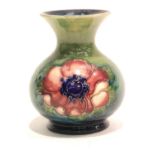 Small Moorcroft Bulbous Pansy vase. P&P Group 2 (£18+VAT for the first lot and £3+VAT for subsequent