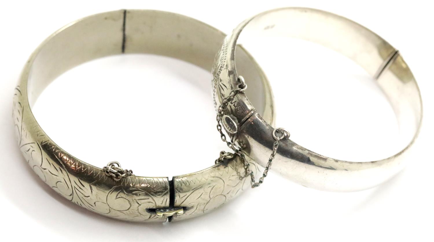 Two silver bangles, one hallmarked other sterling silver, 51g. P&P Group 1 (£14+VAT for the first