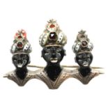 Presumed silver brooch featuring three kings with enamel crowns and coral tops, L: 3 cm. P&P Group 1