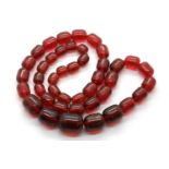 Graduated cherry amber necklace. Largest bead 14 mm. P&P Group 1 (£14+VAT for the first lot and £1+