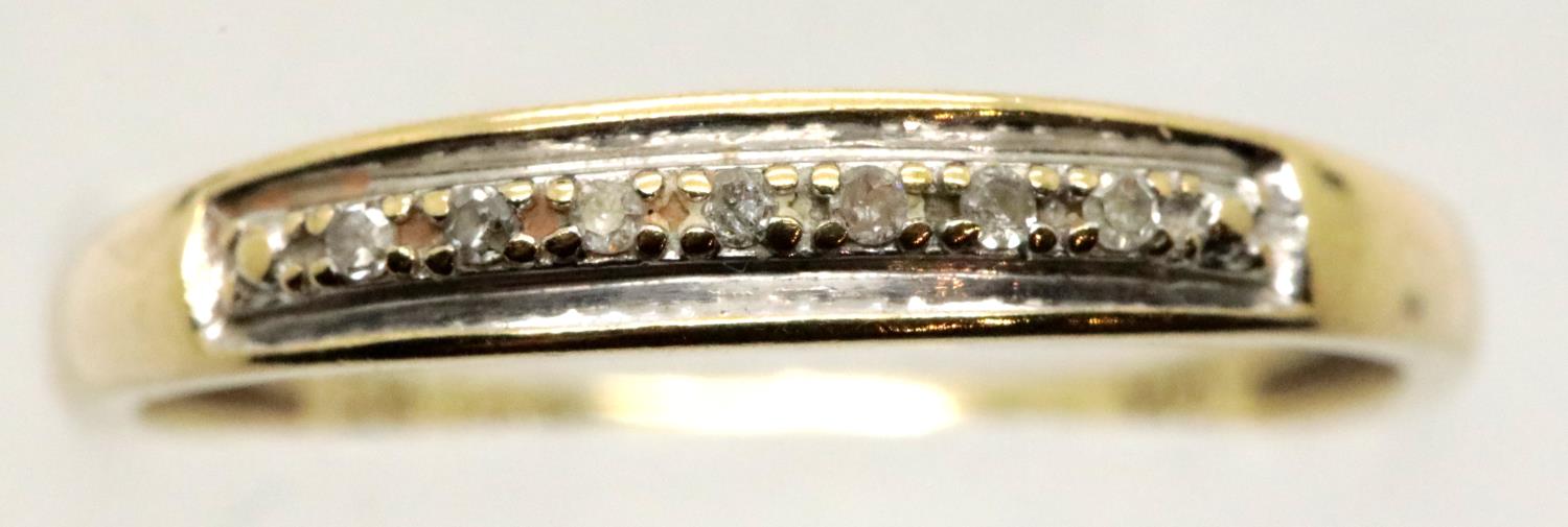 9ct gold ring set with small diamonds, size S, 1.6g. P&P Group 1 (£14+VAT for the first lot and £1+