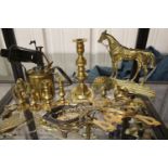 Selection of Victorian and later brass including candlesticks, trivets etc. Not available for in-