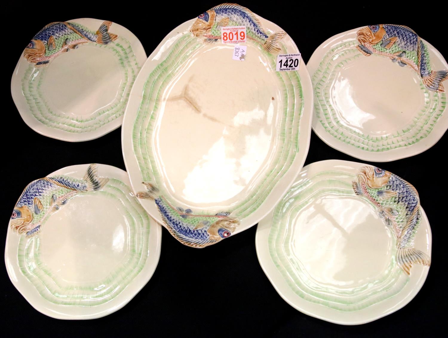 Four small and one large Clarice Cliff ceramic fish plates. P&P Group 3 (£25+VAT for the first lot