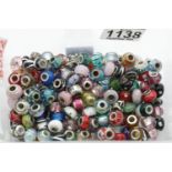 Box of Pandora style beads. P&P Group 1 (£14+VAT for the first lot and £1+VAT for subsequent lots)