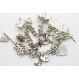 925 silver charm bracelet with 9 charms. P&P Group 1 (£14+VAT for the first lot and £1+VAT for