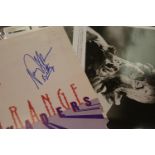 Press pack for Strange Invaders signed to cover, containing photographic prints and five slides. P&P