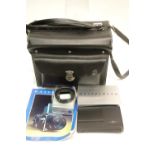 Hasselblad carry case containing Hasselblad magazine 100 for Polaroid film, extension tube 16 and