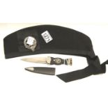 Scottish Military cap with Macpherson clan badge and matching leather sheathed dirk with motto '