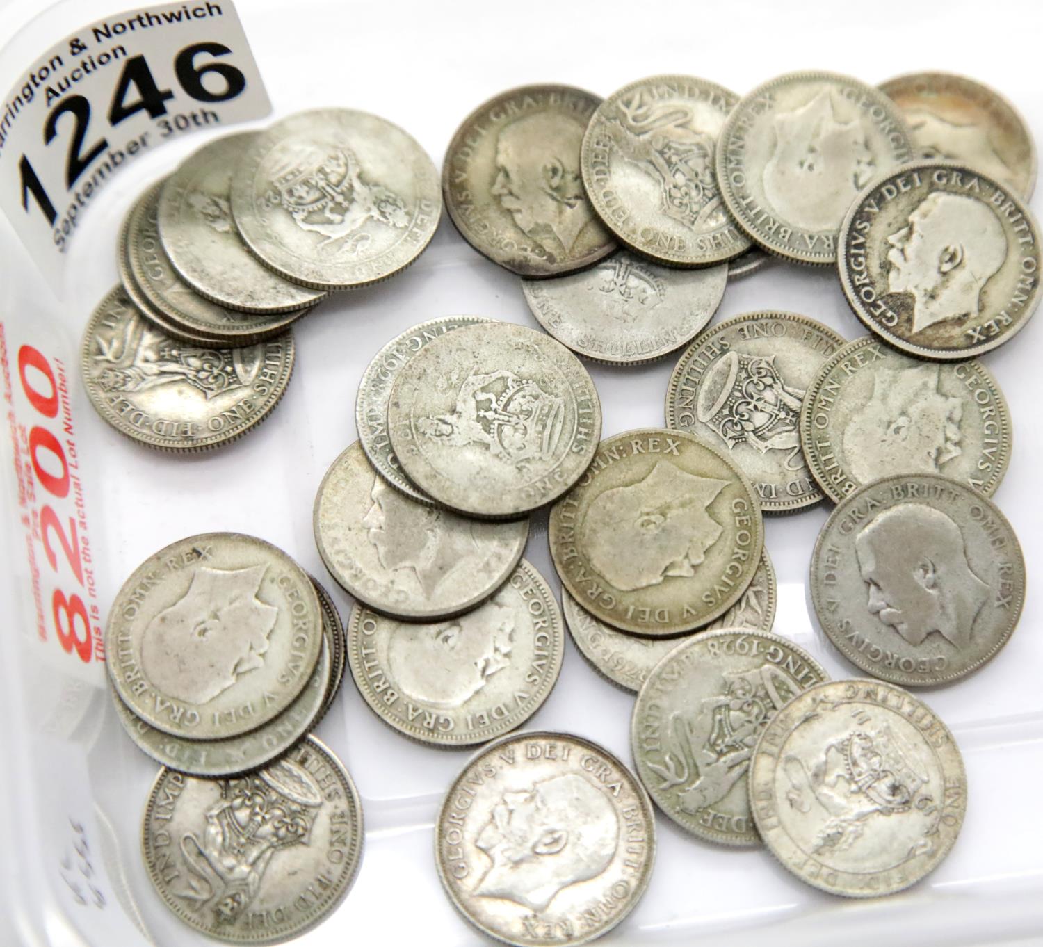 Twenty eight George V silver shillings. P&P Group 1 (£14+VAT for the first lot and £1+VAT for