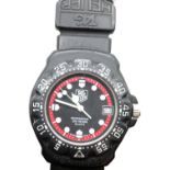 Tag Heuer Professional 200m quartz ladies/youth wristwatch with black rubber strap. P&P Group 1 (£