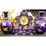 Victorian ceramic clock garniture with French movement. Not available for in-house P&P.