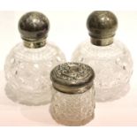 Three hallmarked silver lidded dressing table pots. P&P Group 2 (£18+VAT for the first lot and £3+
