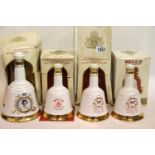 One 75cl and three 50cl Bells whiskies, boxes in poor condition. P&P Group 3 (£25+VAT for the