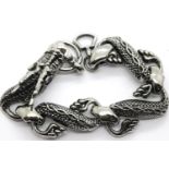 White metal Tibetan silver dragon linked bracelet, L: 15 cm. P&P Group 1 (£14+VAT for the first