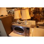 Russell Hobbs microwave and a pair of table lamps. Not available for in-house P&P. Condition Report: