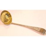 Victorian hallmarked silver sifting spoon with engraved handle and gilt washed bowl, London assay