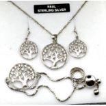 Sterling silver tree pattern pendant bracelet and earrings set. P&P Group 1 (£14+VAT for the first