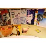 Nine 12" singles including two David Bowie, in good condition. P&P Group 1 (£14+VAT for the first