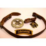 Mixed German WWII type items to include helmet, chin strap, cloth badge etc. P&P Group 1 (£14+VAT